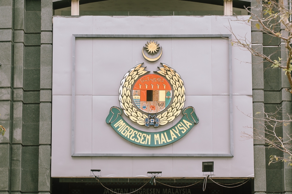 Immigration Raids Dismantle Passport Forgery Operation in Kuala Lumpur, Three Arrested