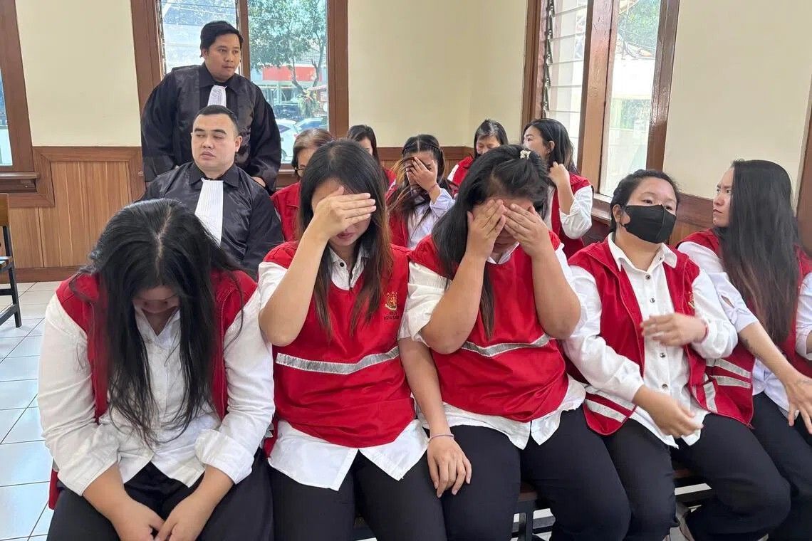 Indonesian court convicts all 19 members of baby trafficking ring that smuggled infants to Singapore