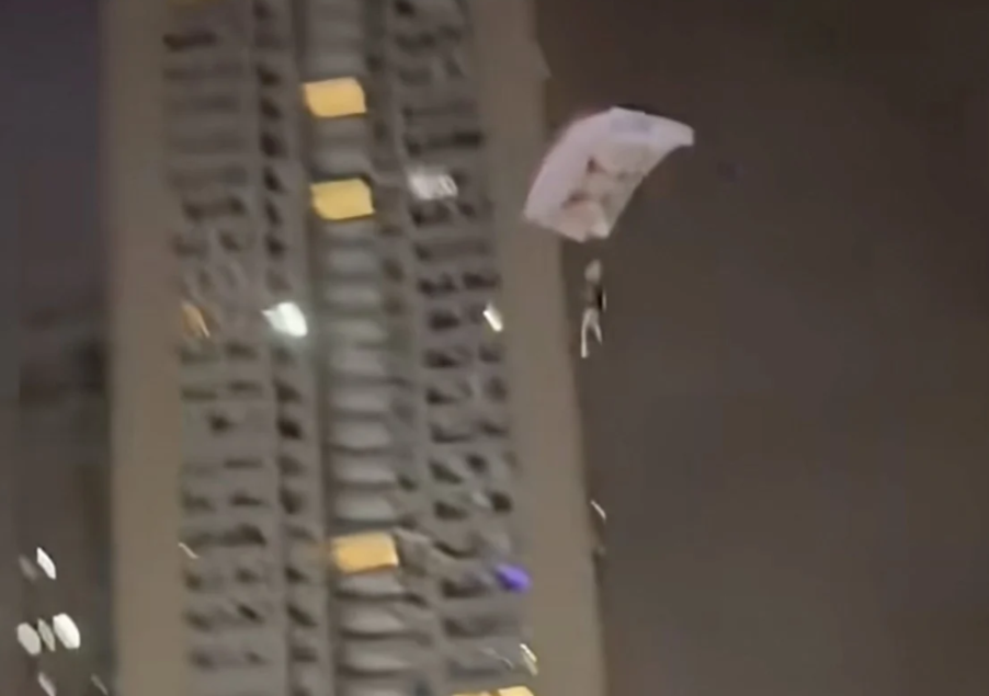 Chinese Man Detained After Rooftop Skydive Stunt Endangers Residential Community