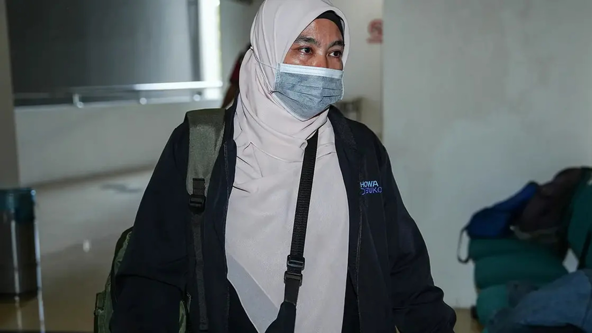 Woman to Face Trial Over Agong Facebook Posts