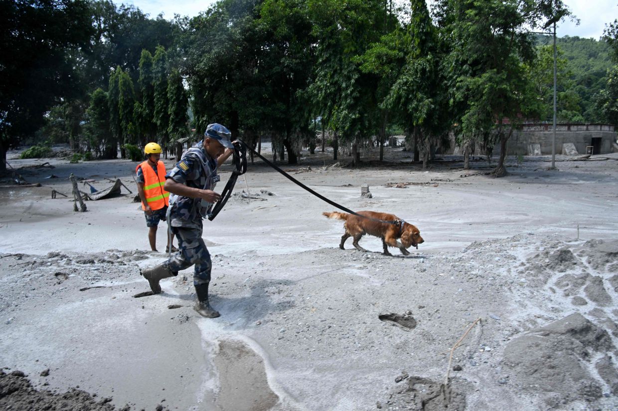 Nepal-Tibet border disaster kills 392 as over 1,400 remain missing from flash floods