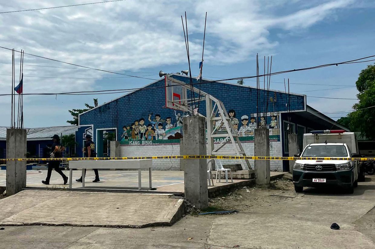 Two teenage students arrested after deadly shooting kills three at Philippine high school