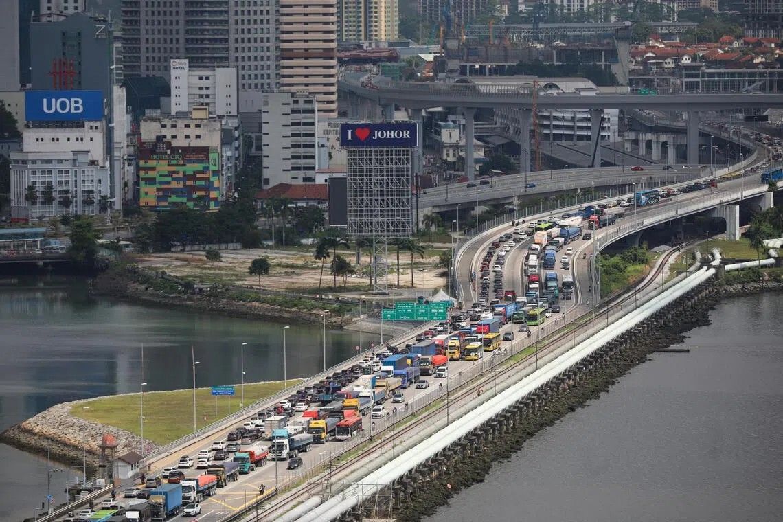 Singapore warns of severe congestion at key land crossings during National Day weekend