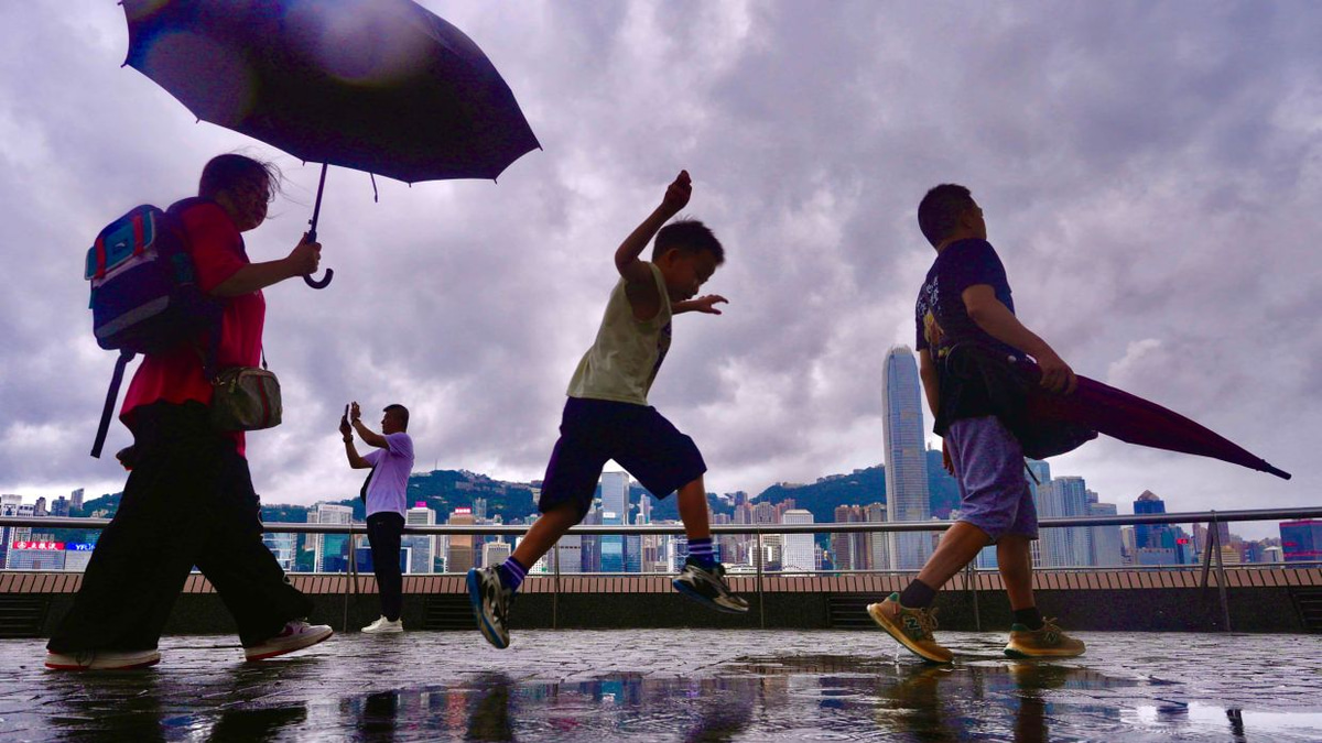 Hong Kong finds respite from historic heatwave as tropical rains sweep in