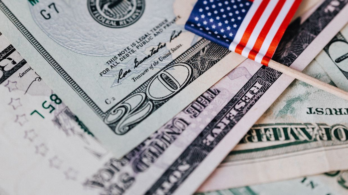 Dollar slides to 12-week low as weak jobs data dims rate hike prospects