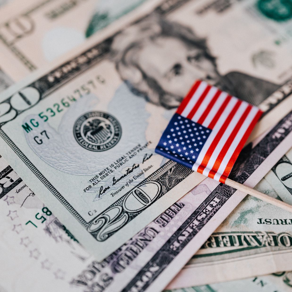 Dollar slides to 12-week low as weak jobs data dims rate hike prospects