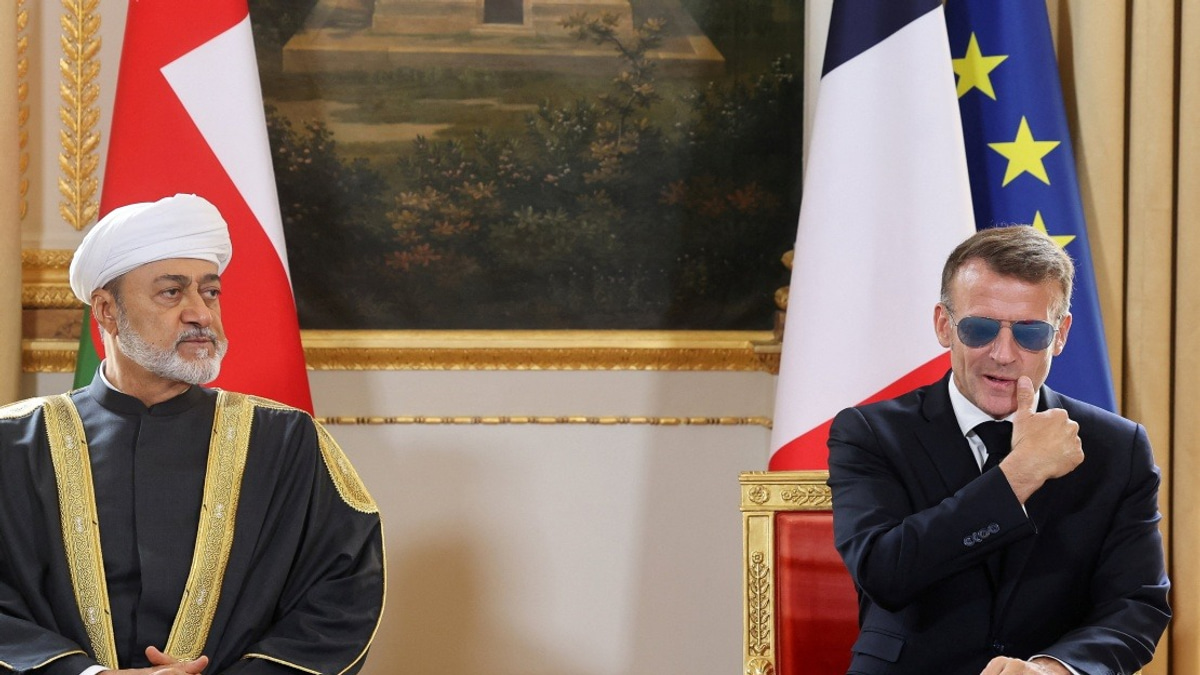 Macron's Signature Sunglasses Return: Medical Necessity Behind the Aviators at Oman Meeting