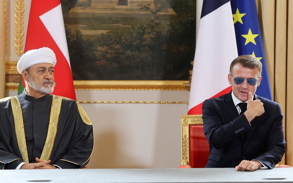 Macron's Signature Sunglasses Return: Medical Necessity Behind the Aviators at Oman Meeting