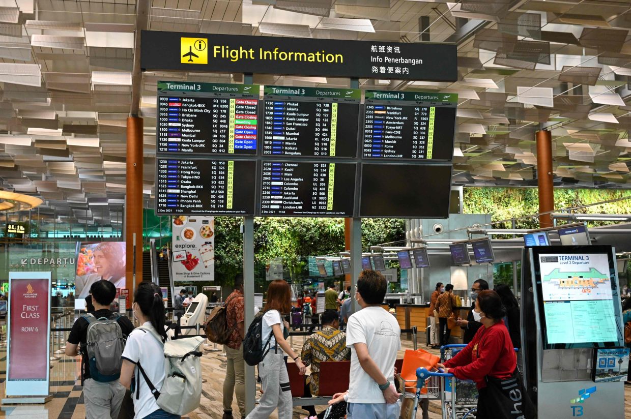 Hong Kong mother and son jailed in Singapore for Changi Airport assault on police officer