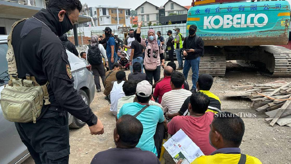 Malaysia arrests 528 foreign workers in construction site immigration sweep