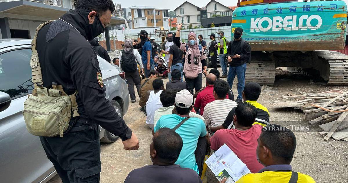 Malaysia arrests 528 foreign workers in construction site immigration sweep