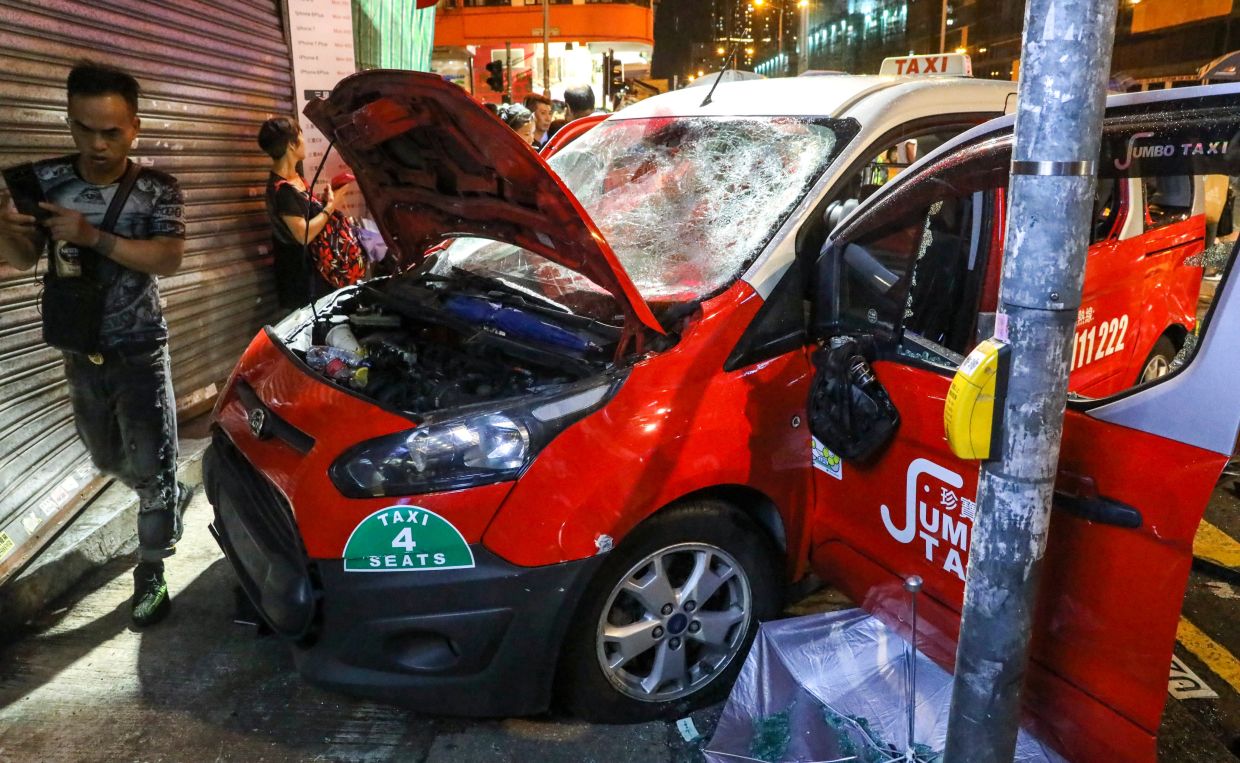Hong Kong Woman Seeks HK$8.4 Million in Damages After Taxi Struck Her During 2019 Protest