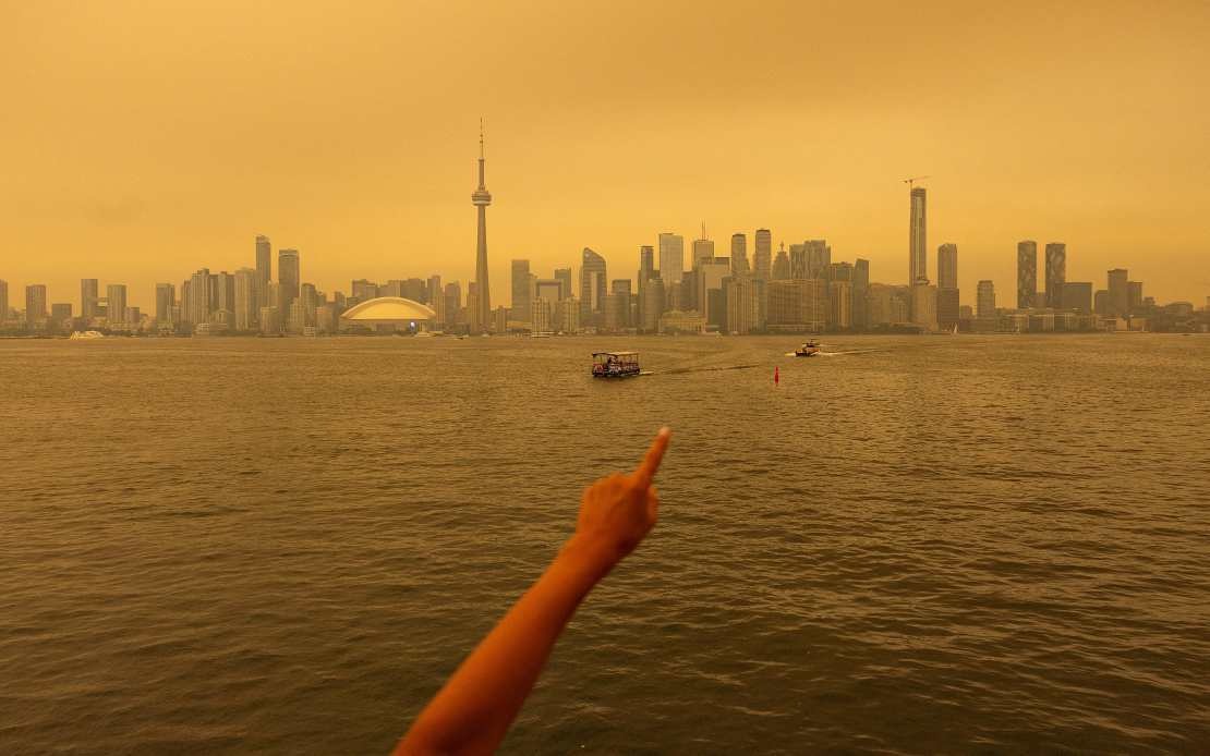 Ontario Wildfires Blanket Canadian Cities in Hazardous Smog, Disrupt Rail Operations