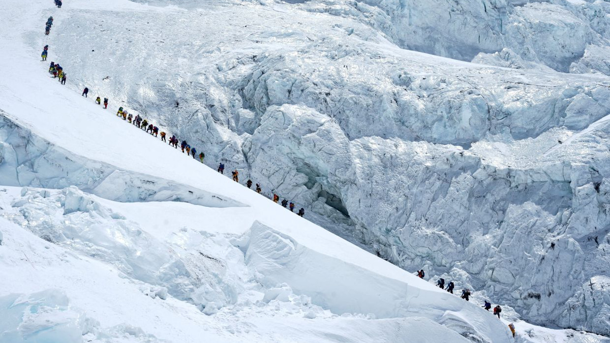 Record 274 climbers reach Mount Everest summit in single day from Nepal