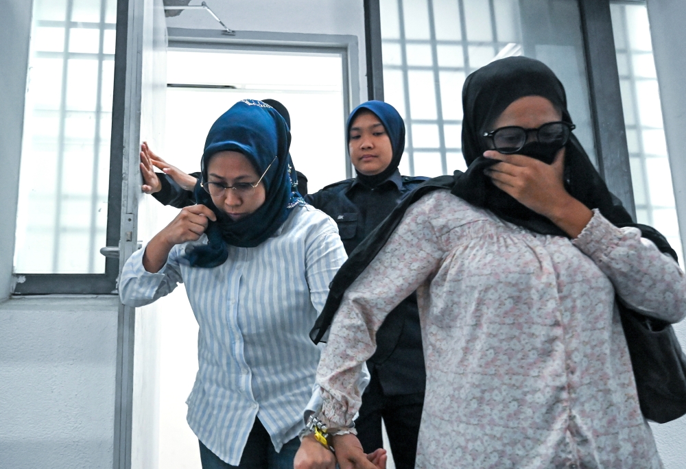 Two women charged with defrauding Perak retiree of RM120,000 in tax scam
