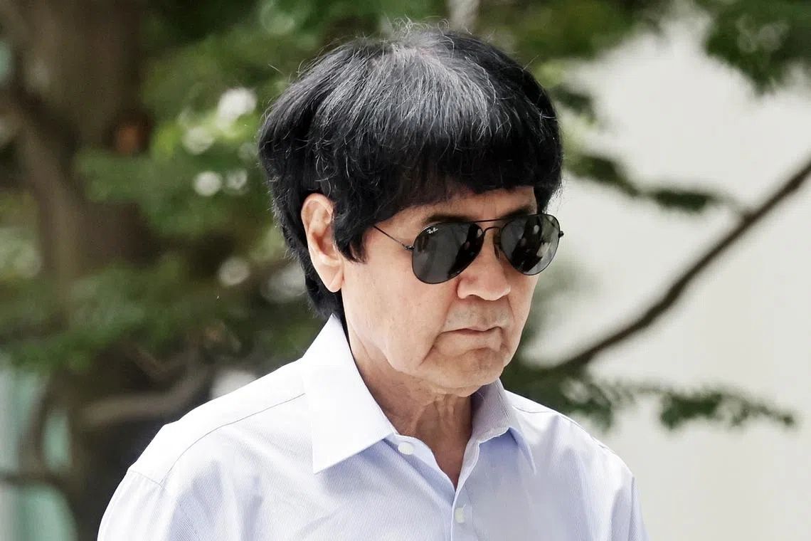 Singapore fines former air force chief S$5,000 for hitting woman with stroller